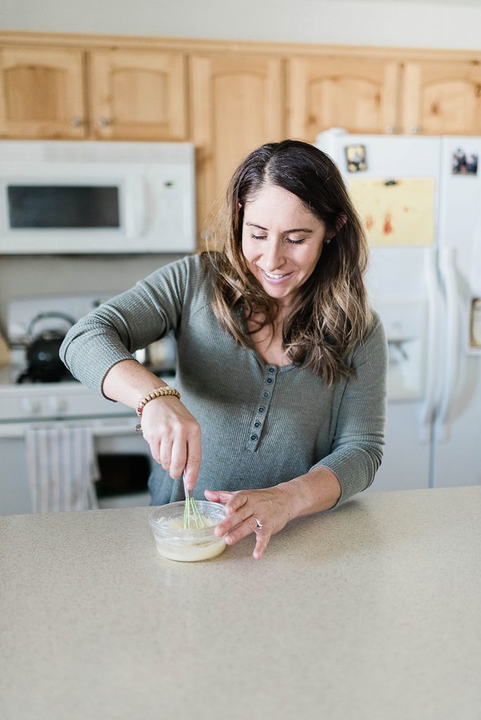 Photo of Andie making the roux to help thicken the Velveeta broccoli soup 