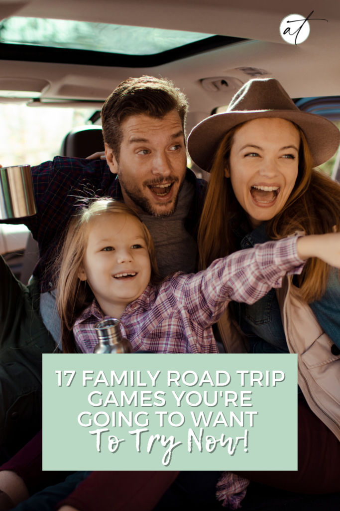 Family in car enjoying family road trip games. They seem cozy and happy together. 